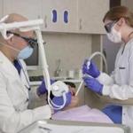 Dr. Mark Mizner of Commonwealth Dental Group in Boston performed the first cavity filling using the Solea laser last year on Convergent chief executive Mike Cataldo.